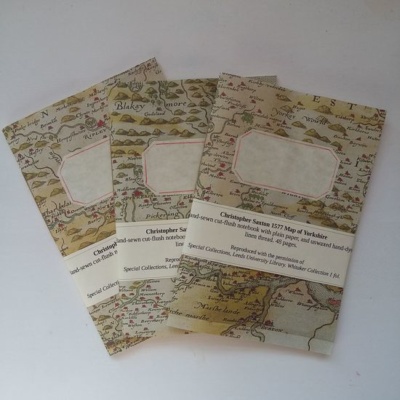 Three pamphlets with covers made of Yorkshire map print with handmade stuck on labels