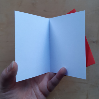 A card held open to show the blank interior