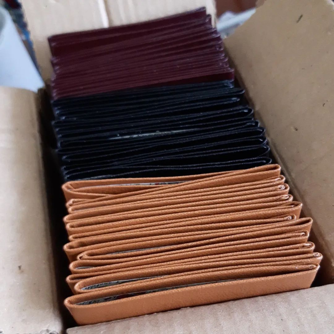 Many pocket books ready to fill and foil. It's all go for the summer fairs.

[Image description: a box with folded pamphlets covers in three colours.]

#BatchMaking #WorkInProgress #FairPrep